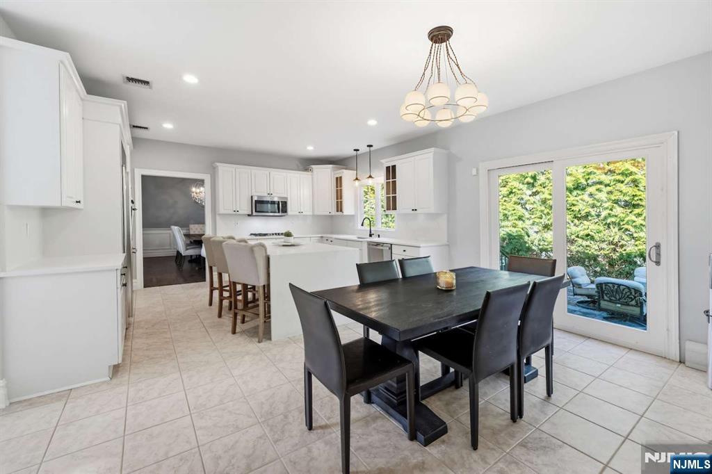 8 Wainwright Court Closter, NJ 07624 - Photo 7 of 29 a view of a dining room with furniture window and outside view