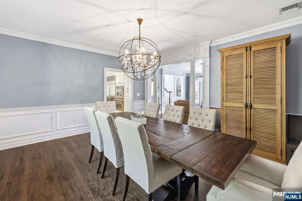 8 Wainwright Court Closter, NJ 07624 - Photo 8 of 29 a view of a dining room with furniture window and wooden floor