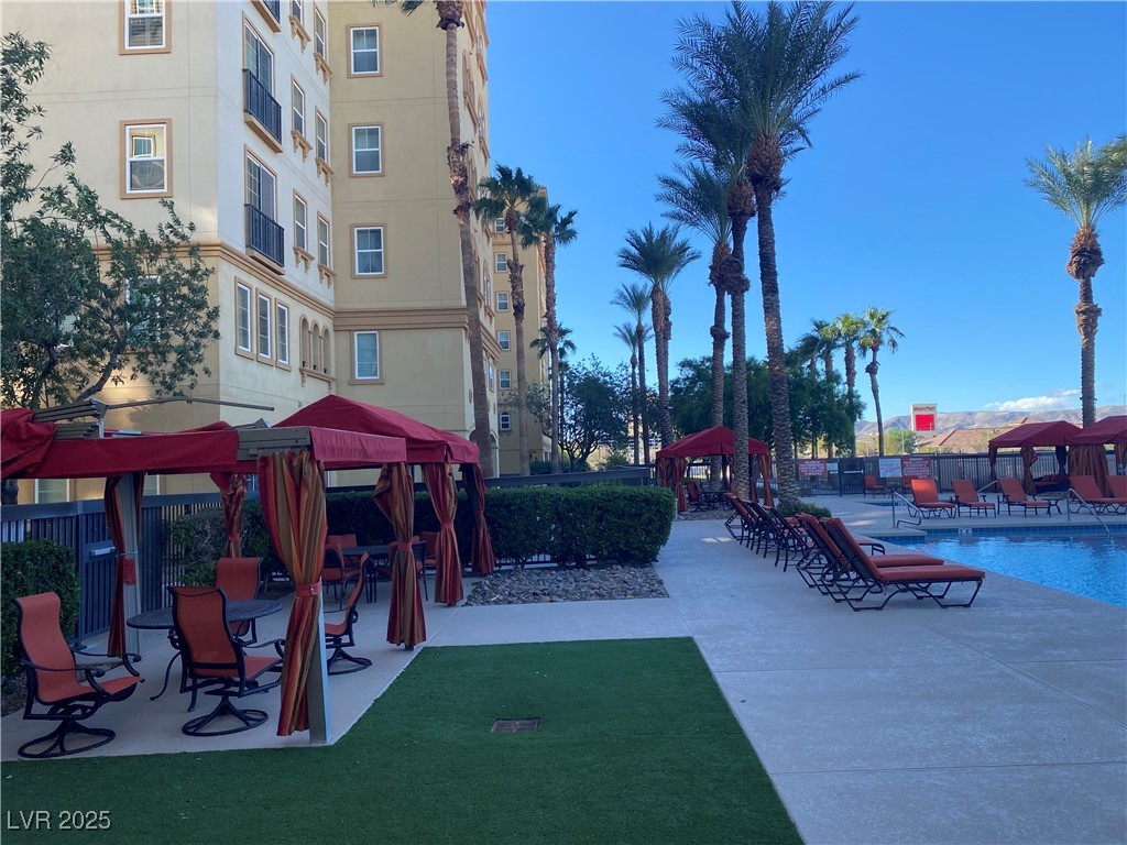 2405 West Serene Avenue, Unit 827 Las Vegas, NV 89123 - Photo 16 of 48 Surrounding community with a gazebo, a patio, and a pool