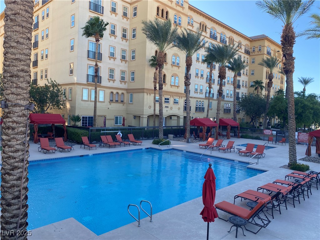 2405 West Serene Avenue, Unit 827 Las Vegas, NV 89123 - Photo 17 of 48 Community pool with a patio