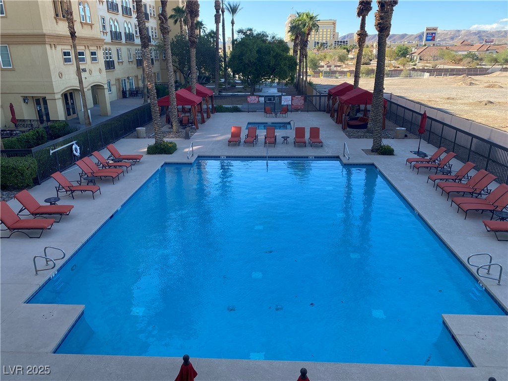 2405 West Serene Avenue, Unit 827 Las Vegas, NV 89123 - Photo 18 of 48 Community pool with a patio area