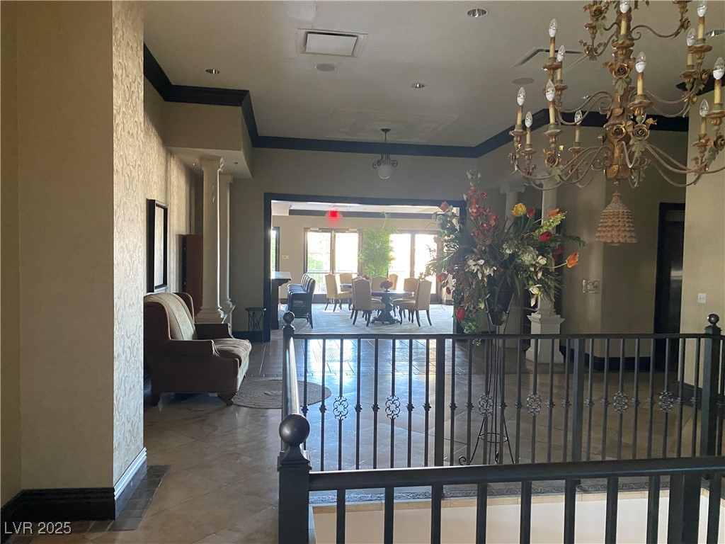 2405 West Serene Avenue, Unit 827 Las Vegas, NV 89123 - Photo 25 of 48 Community lobby featuring crown molding