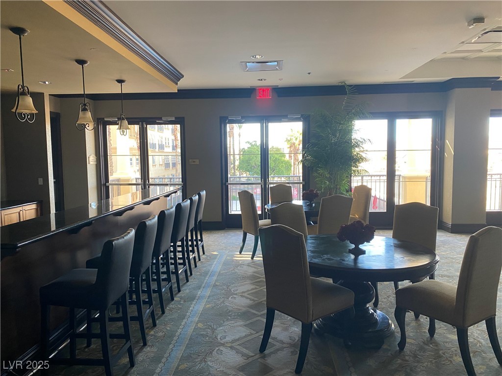 2405 West Serene Avenue, Unit 827 Las Vegas, NV 89123 - Photo 27 of 48 Dining room with plenty of natural light and carpet floors