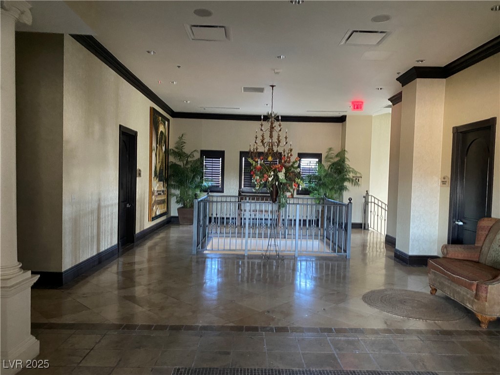 2405 West Serene Avenue, Unit 827 Las Vegas, NV 89123 - Photo 33 of 48 Community lobby with crown molding