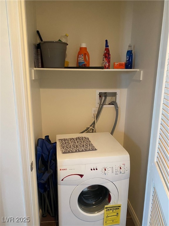 2405 West Serene Avenue, Unit 827 Las Vegas, NV 89123 - Photo 42 of 48 Washroom featuring washer / clothes dryer and tile patterned flooring
