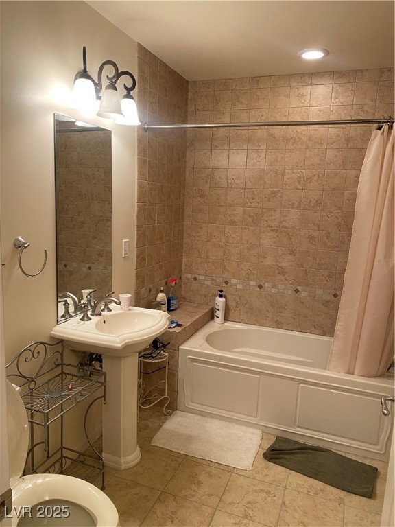 2405 West Serene Avenue, Unit 827 Las Vegas, NV 89123 - Photo 48 of 48 Bathroom featuring shower / bathtub combination with curtain and light tile patterned flooring