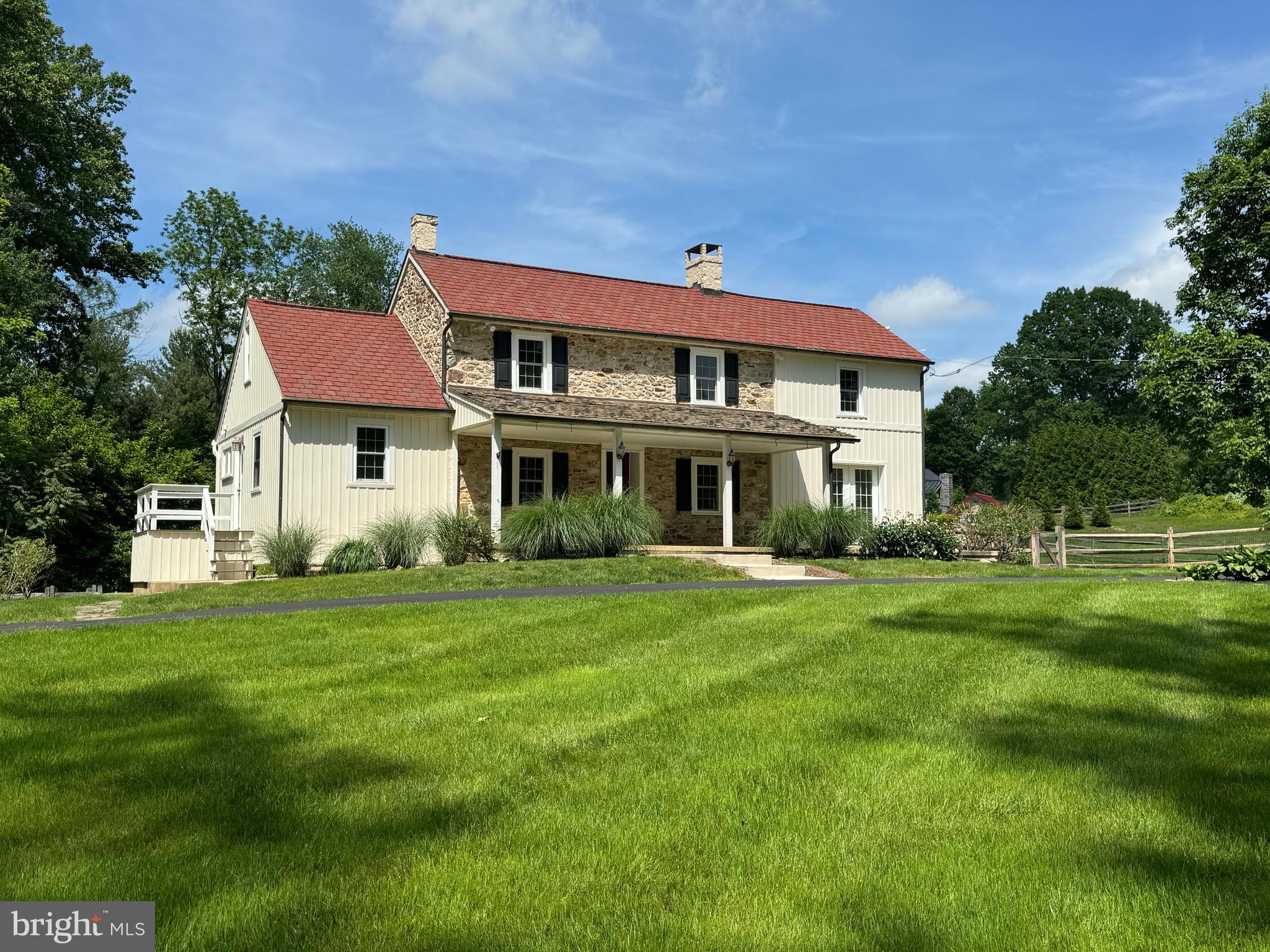 553 Worthington Road Chester Springs, PA 19425 - Photo 2 of 33 a view of a house with a yard