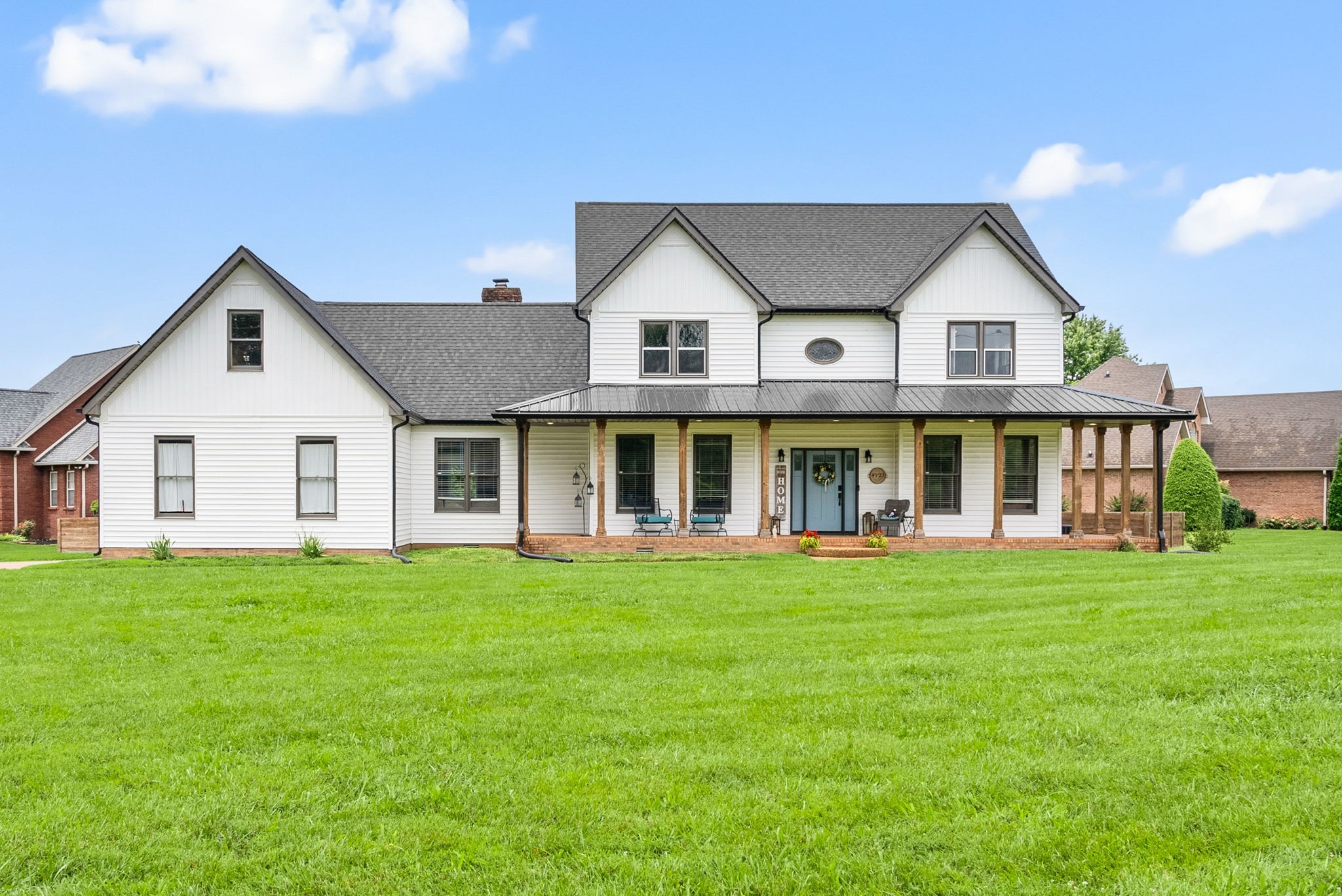 4921 Sango Road Clarksville, TN 37043 - Photo 1 of 52 a view of a house with a big yard and large trees