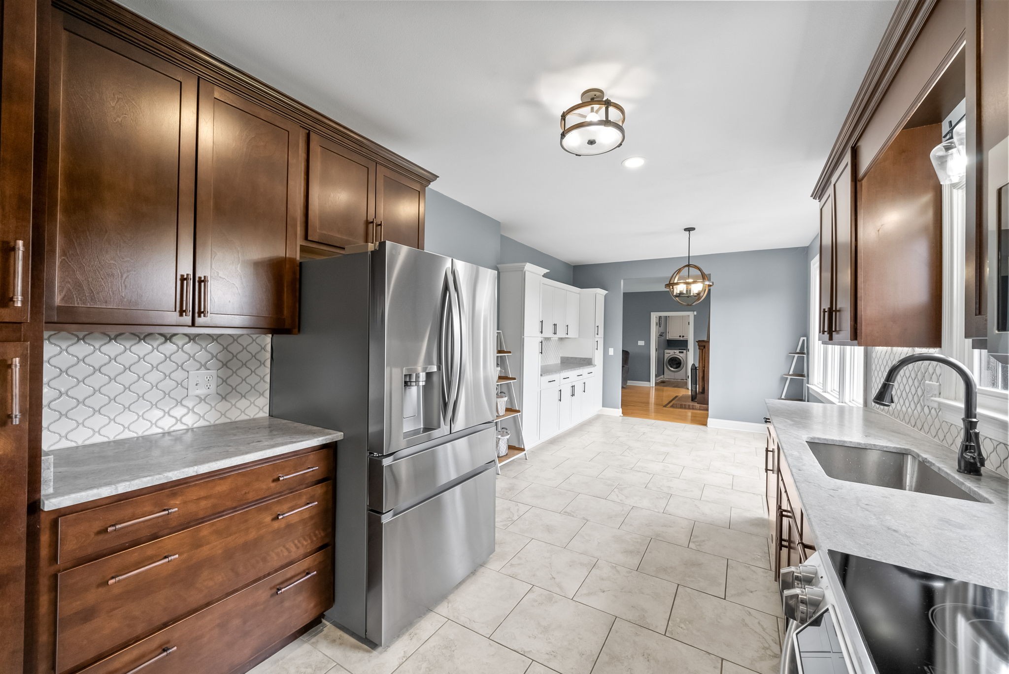 4921 Sango Road Clarksville, TN 37043 - Photo 14 of 52 a kitchen with stainless steel appliances granite countertop a refrigerator and a sink
