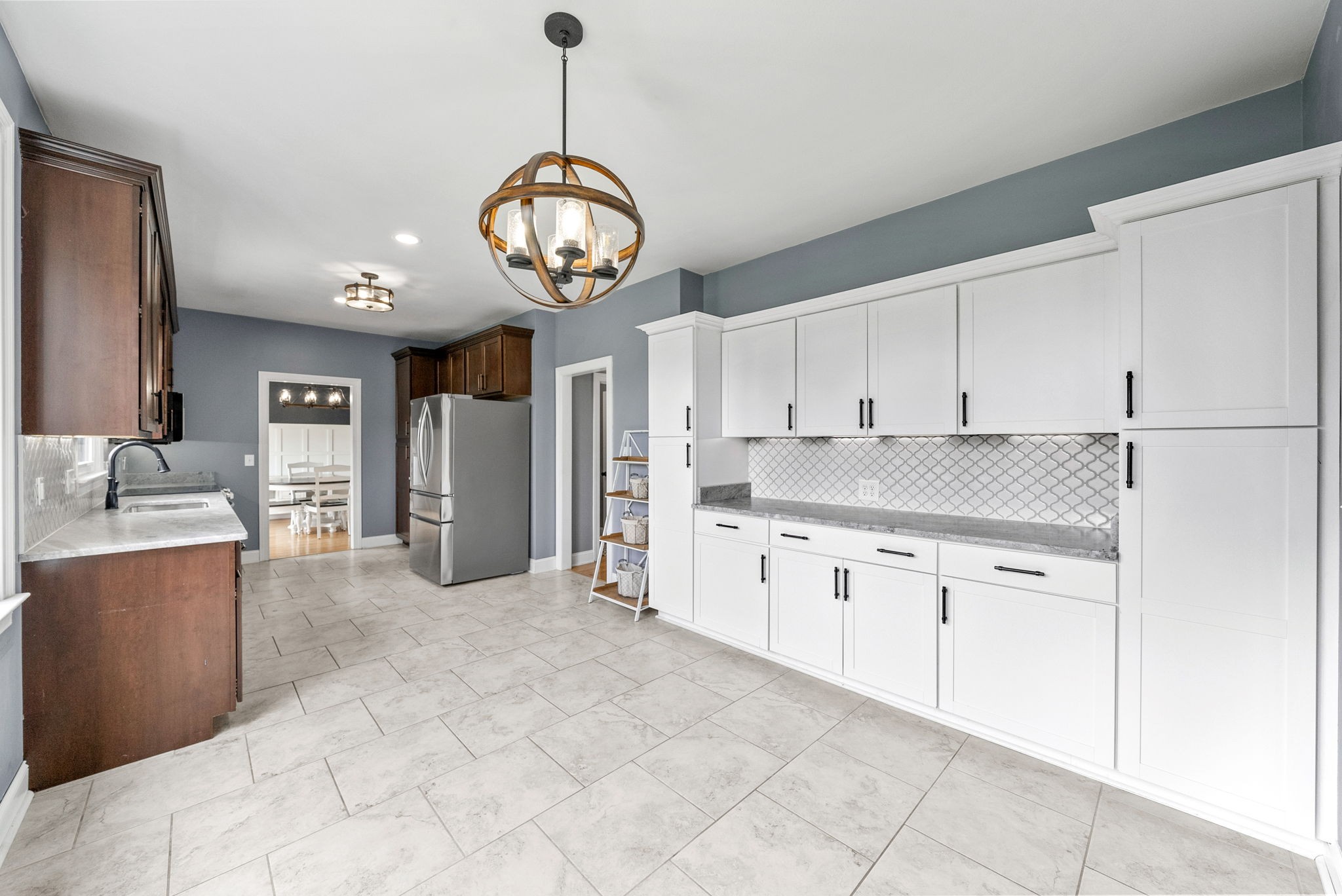 4921 Sango Road Clarksville, TN 37043 - Photo 15 of 52 a open kitchen with cabinets a stove and stainless steel appliances