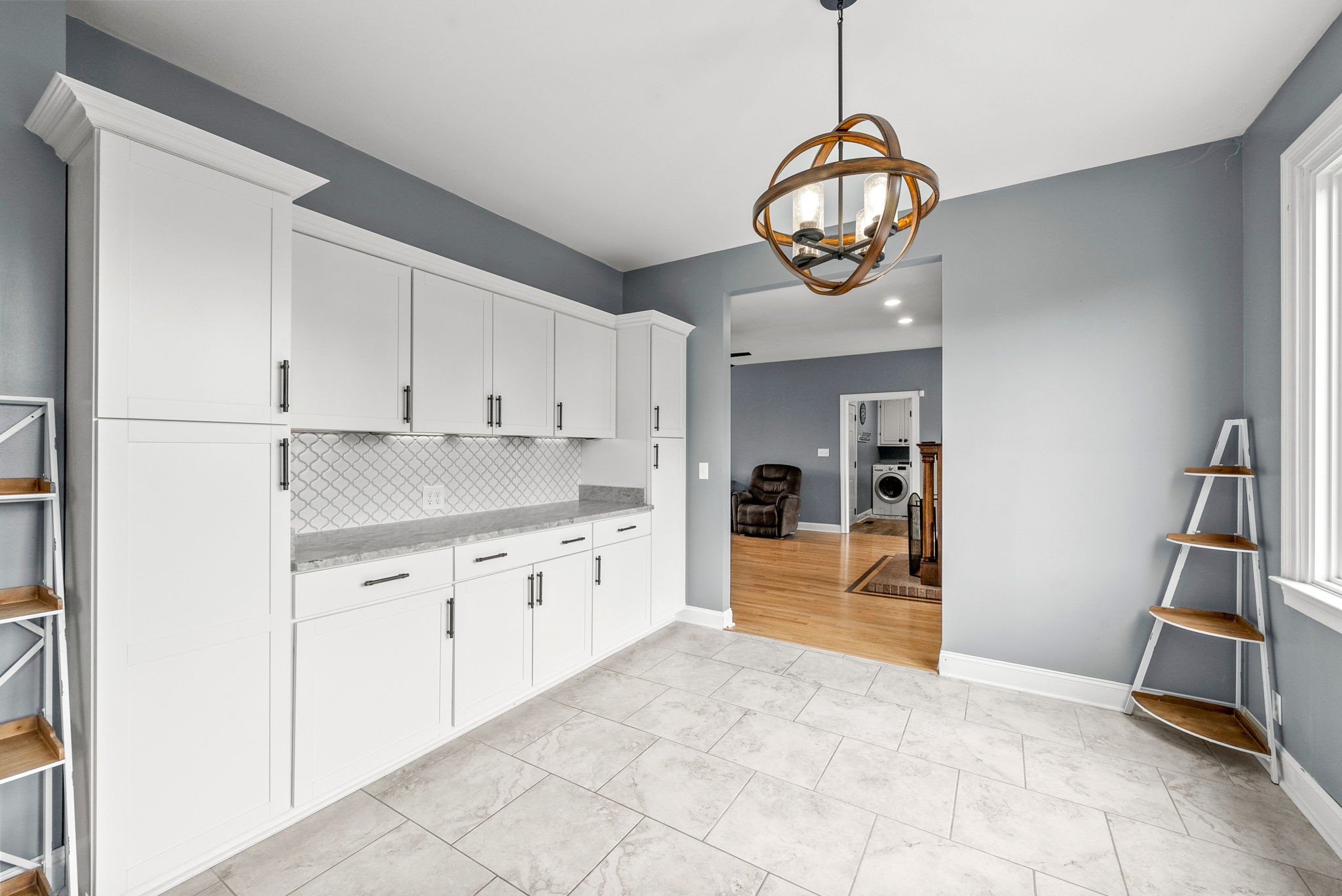 4921 Sango Road Clarksville, TN 37043 - Photo 20 of 52 a kitchen with cabinets and window