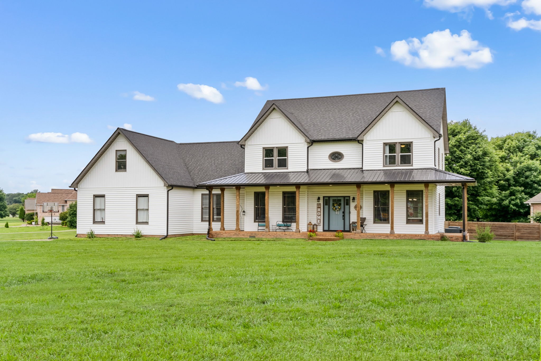 4921 Sango Road Clarksville, TN 37043 - Photo 2 of 52 a front view of a house with a yard