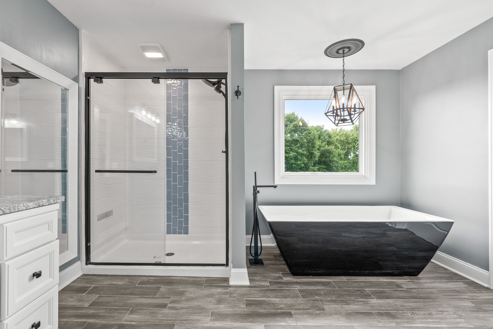 4921 Sango Road Clarksville, TN 37043 - Photo 30 of 52 a bathroom with a bathtub and a shower