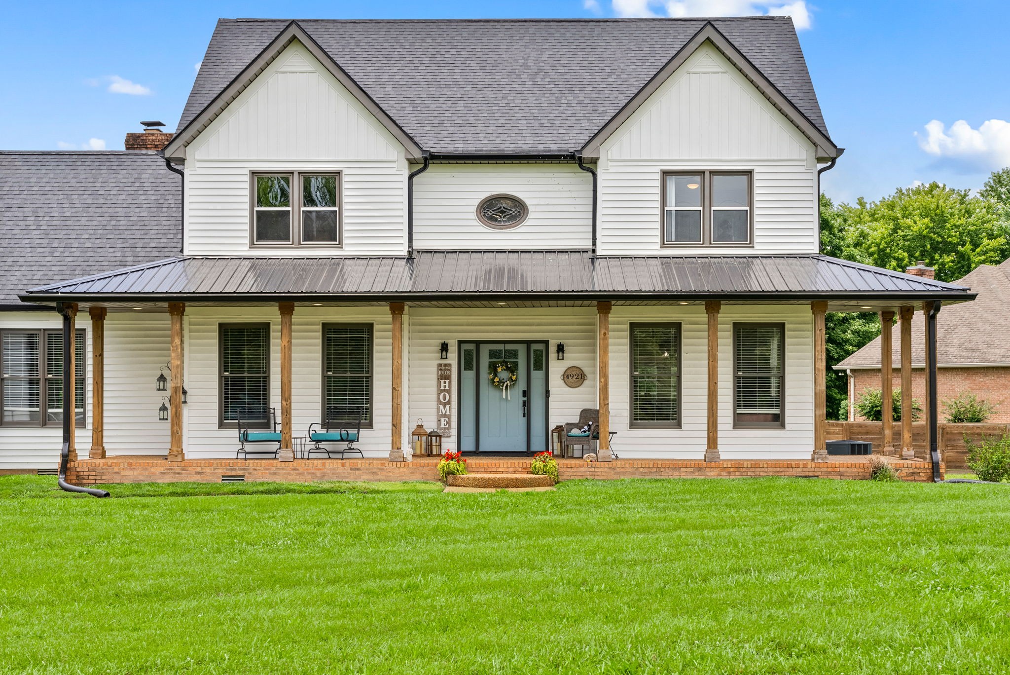 4921 Sango Road Clarksville, TN 37043 - Photo 3 of 52 front view of a house with a yard