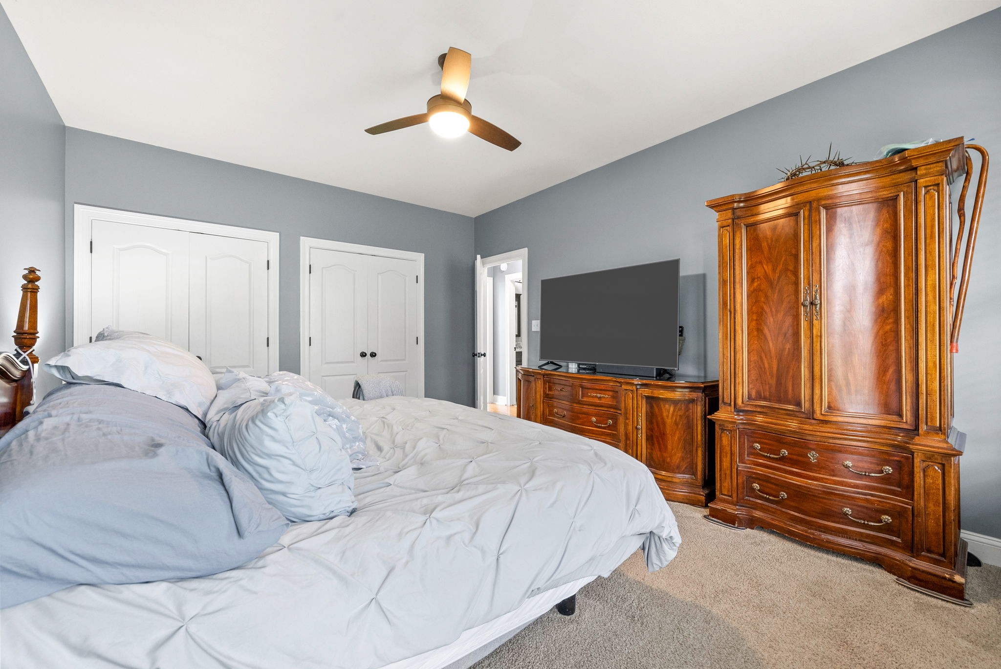 4921 Sango Road Clarksville, TN 37043 - Photo 33 of 52 a bedroom with a bed and a flat screen tv