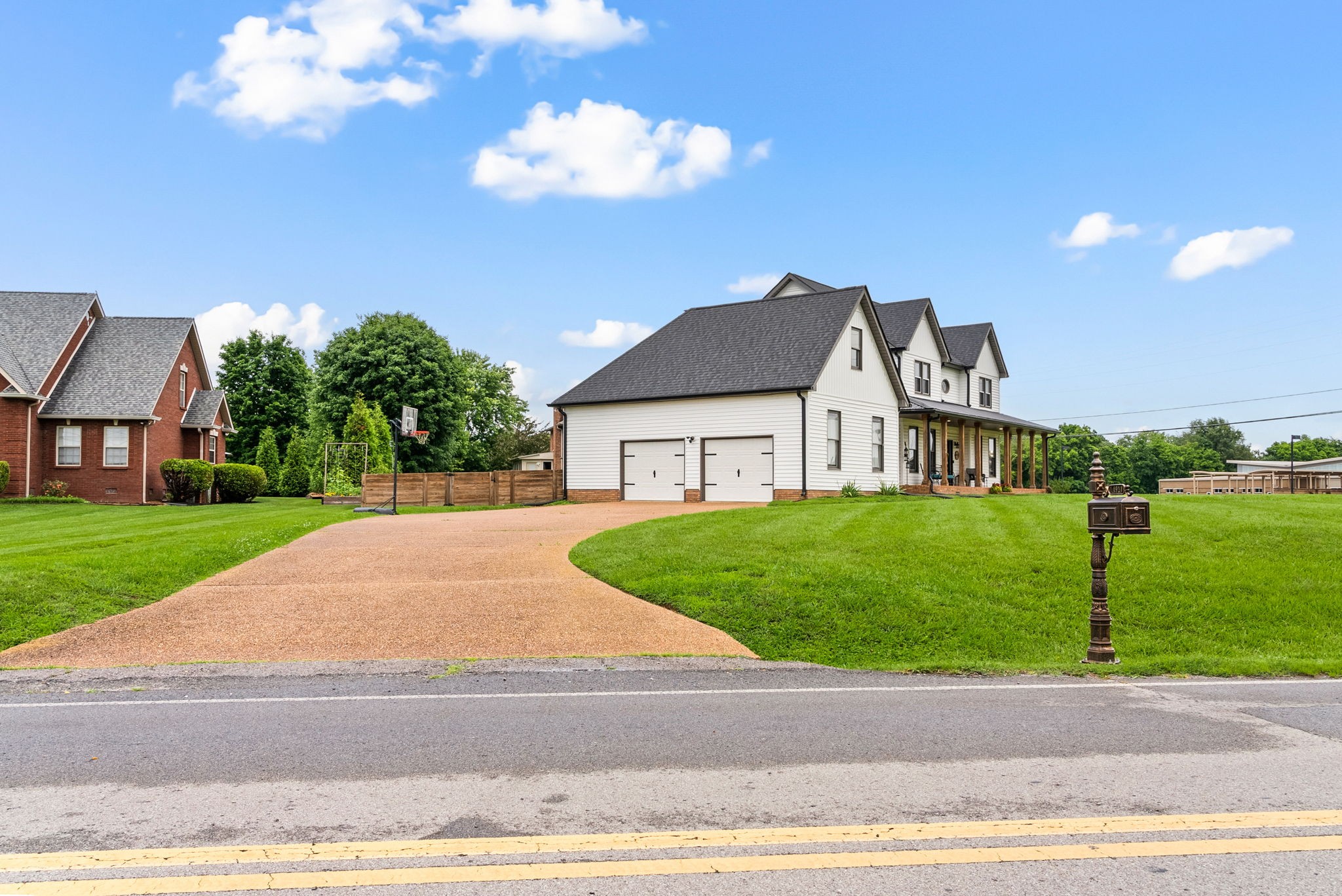 4921 Sango Road Clarksville, TN 37043 - Photo 5 of 52 a yellow and red house with a garden