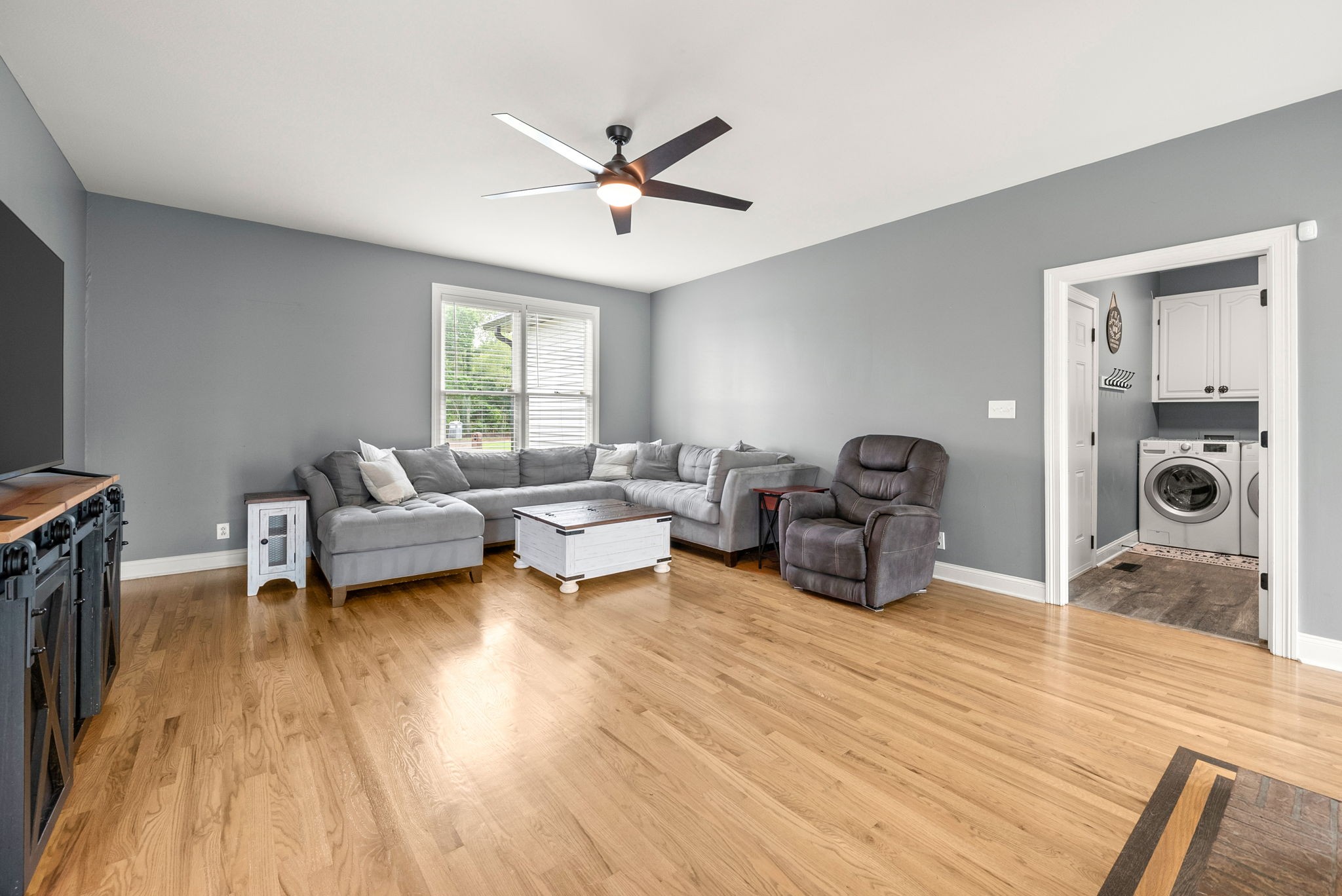 4921 Sango Road Clarksville, TN 37043 - Photo 7 of 52 a living room with furniture and a wooden floor