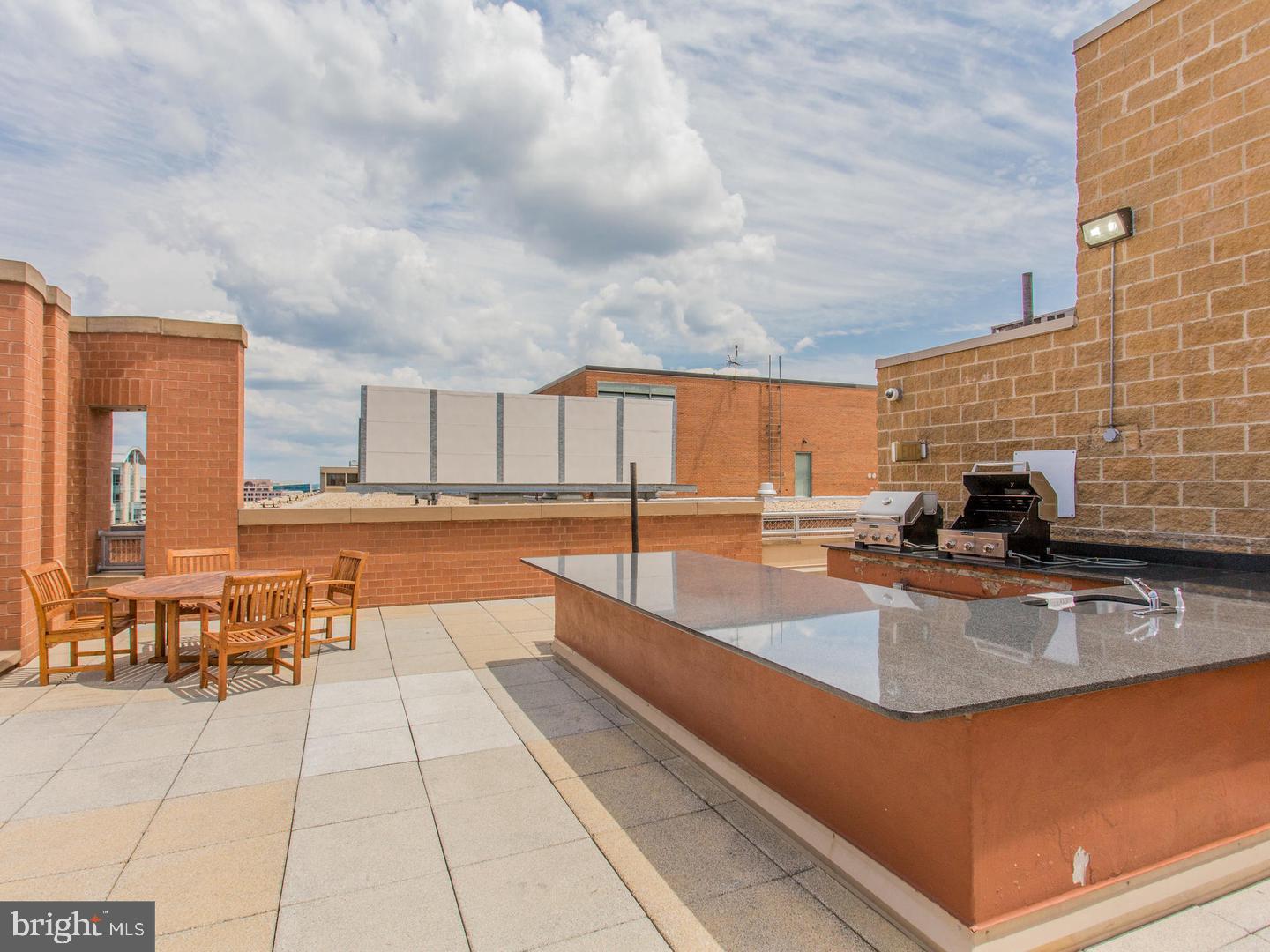 631 D Street Northwest, Unit 1038 Washington, DC 20004 - Photo 23 of 56 a view of kitchen with granite countertop lots of counter top space