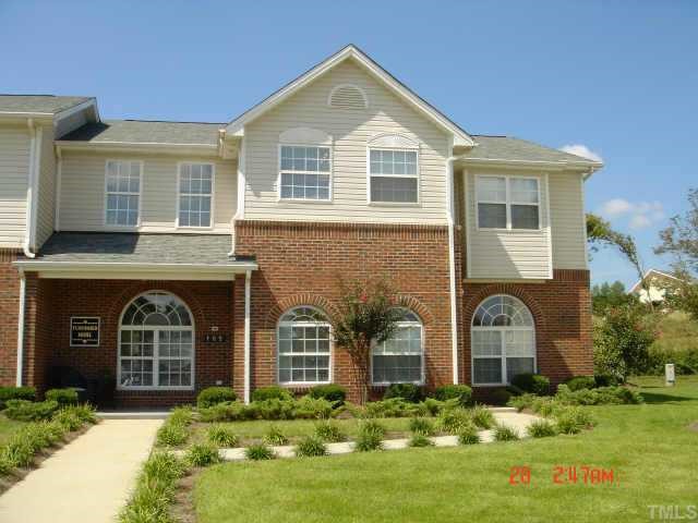 2101-106 Piney Brook Road Raleigh, NC 27614 - Photo 1 of 1 a front view of a house with garden