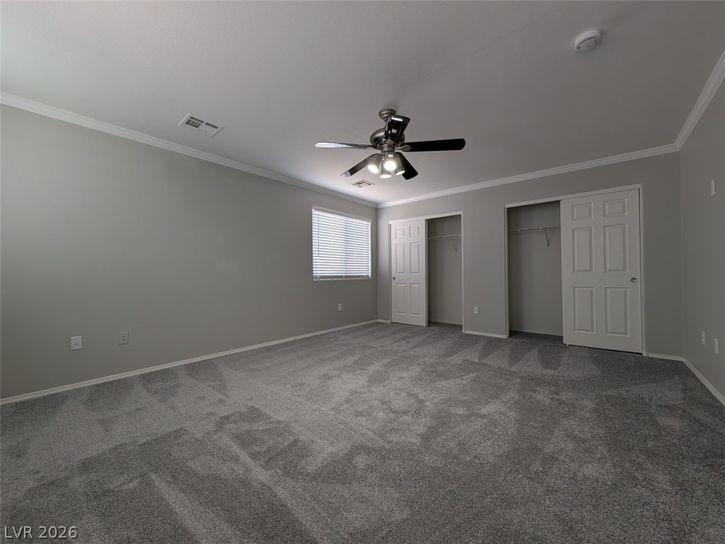 10308 Faustine Avenue Las Vegas, NV 89129 - Photo 22 of 28 A spacious sleeping area offers new carpeting and bright natural light.