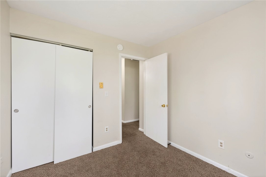 3659 Trail-On Road Dayton, OH 45439 - Photo 22 of 38 This cozy bedroom features carpeted flooring and ample closet space, providing a comfortable living area.