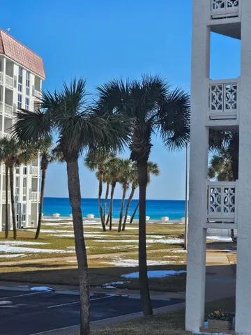 a view of living room with furniture and garden view