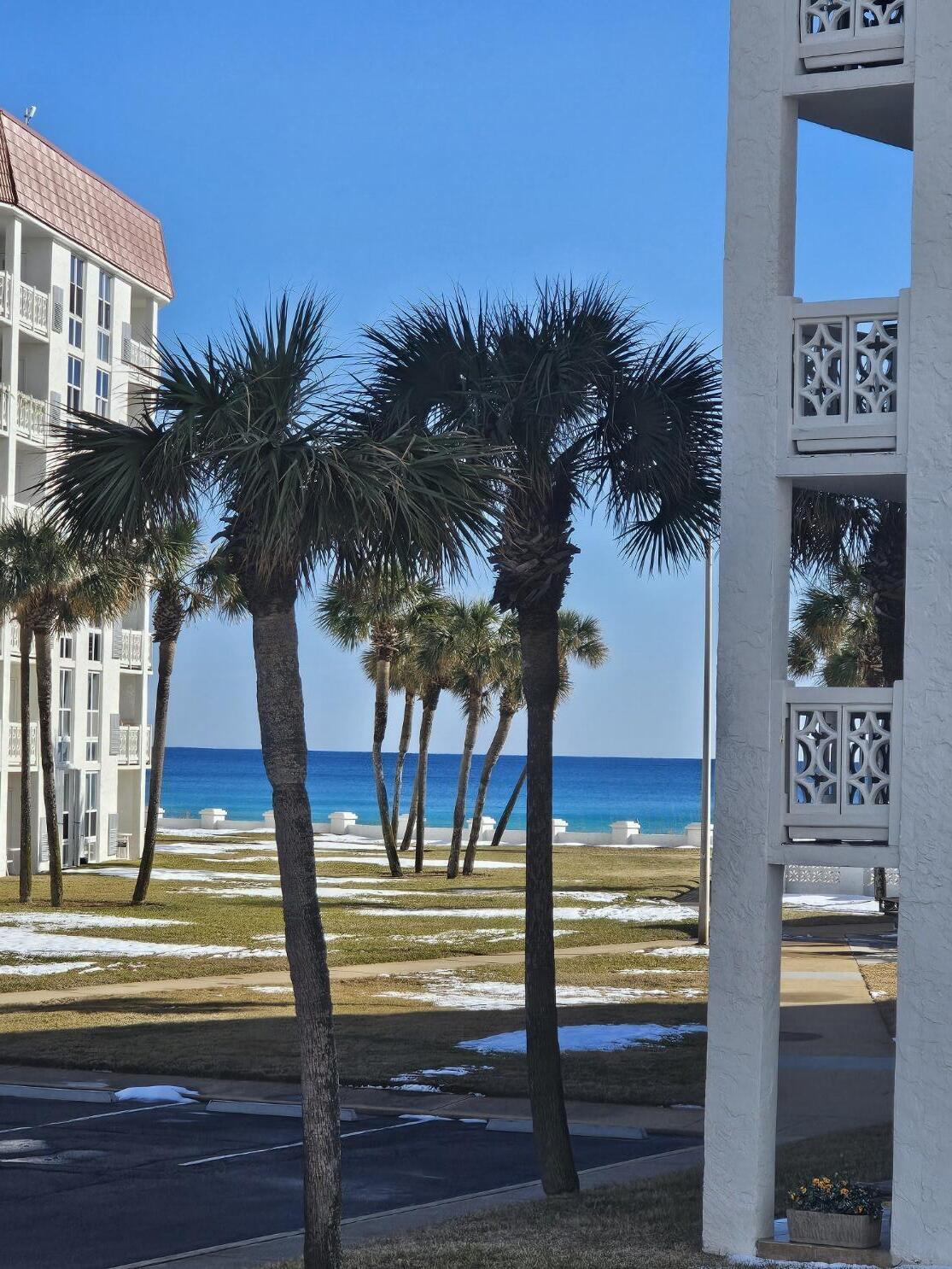 909 Santa Rosa Boulevard, Unit 229 Fort Walton Beach, FL 32548 - Photo 13 of 36 a view of living room with furniture and garden view