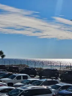 a view of a water fountain and an ocean view