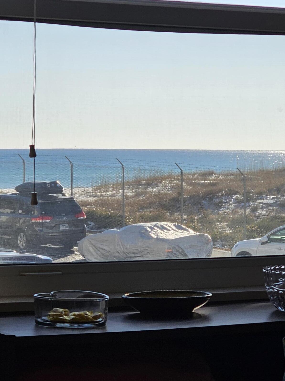 909 Santa Rosa Boulevard, Unit 229 Fort Walton Beach, FL 32548 - Photo 16 of 36 a view of a terrace with wooden floor