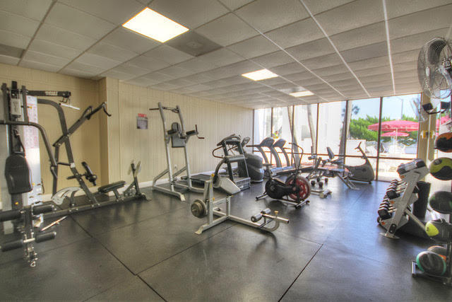 909 Santa Rosa Boulevard, Unit 229 Fort Walton Beach, FL 32548 - Photo 33 of 36 a view of a room with gym equipment