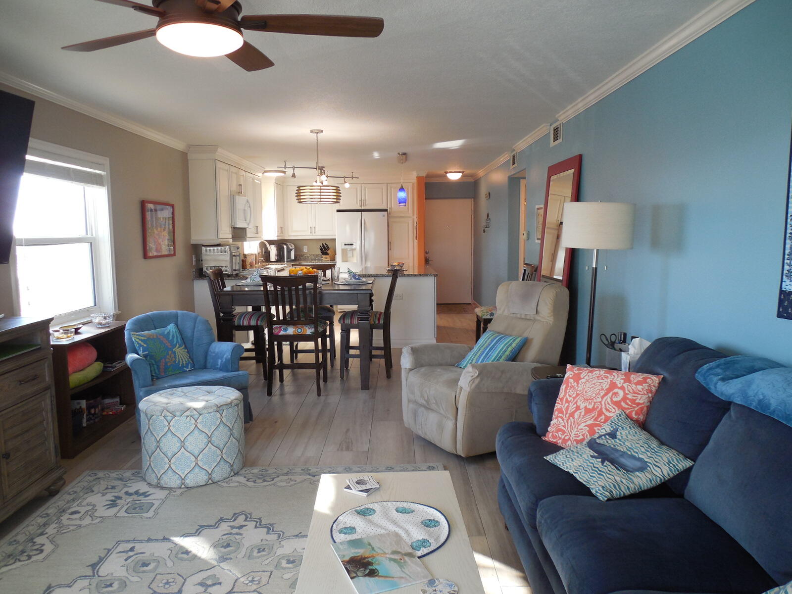 909 Santa Rosa Boulevard, Unit 229 Fort Walton Beach, FL 32548 - Photo 9 of 36 a living room with furniture and wooden floor