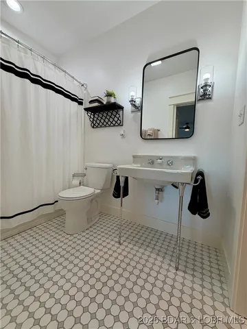 $775,000 | 105 Jumping Bass Cove Road, Roach, MO 65787