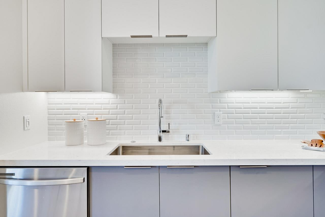 3698 Vision Common, Unit 221 Fremont, CA 94538 - Photo 17 of 62 a kitchen with a sink and cabinets