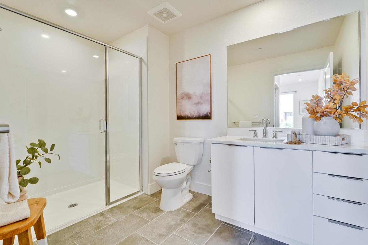 3698 Vision Common, Unit 221 Fremont, CA 94538 - Photo 24 of 62 a bathroom with a sink toilet and shower