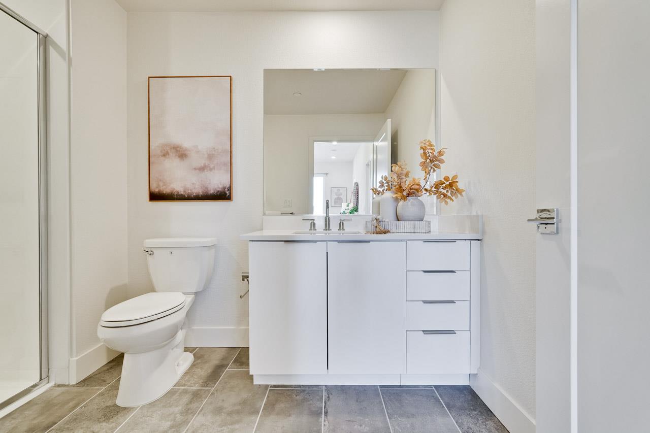 3698 Vision Common, Unit 221 Fremont, CA 94538 - Photo 25 of 62 a bathroom with a sink and a toilet