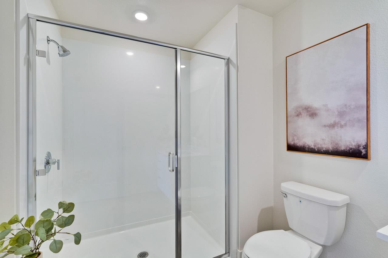 3698 Vision Common, Unit 221 Fremont, CA 94538 - Photo 27 of 62 a bathroom with a shower and a toilet