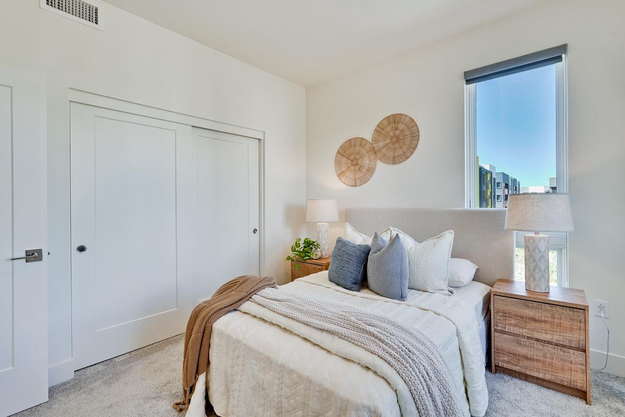 3698 Vision Common, Unit 221 Fremont, CA 94538 - Photo 28 of 62 a bedroom with bed and a window