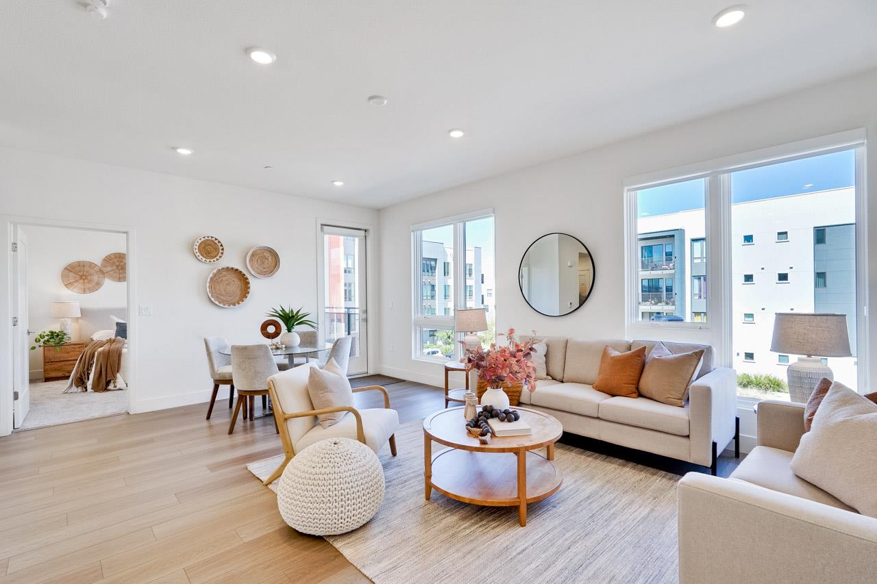 3698 Vision Common, Unit 221 Fremont, CA 94538 - Photo 3 of 62 a living room with furniture and wooden floor