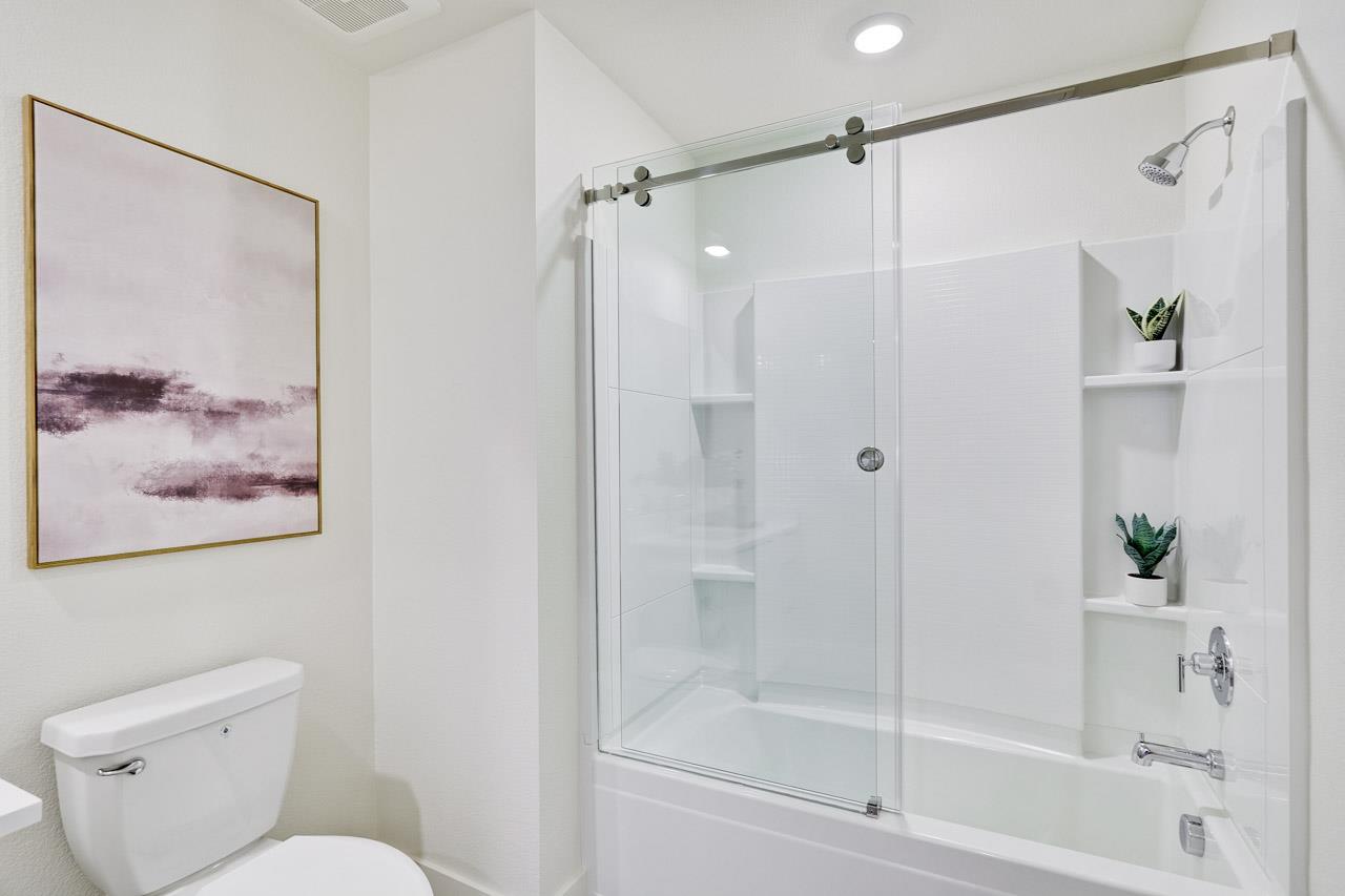 3698 Vision Common, Unit 221 Fremont, CA 94538 - Photo 34 of 62 a bathroom with a shower and a toilet