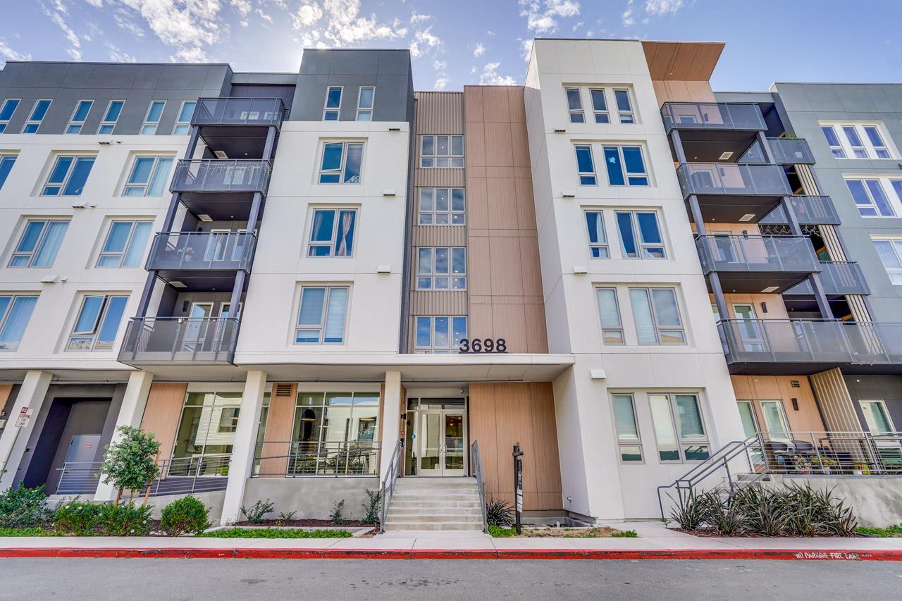 3698 Vision Common, Unit 221 Fremont, CA 94538 - Photo 40 of 62 a front view of a multi story residential apartment building