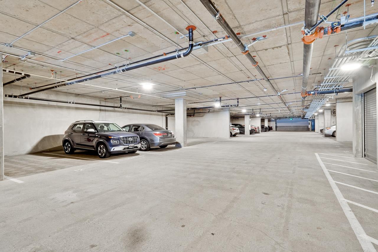 3698 Vision Common, Unit 221 Fremont, CA 94538 - Photo 41 of 62 a view of parking garage with cars