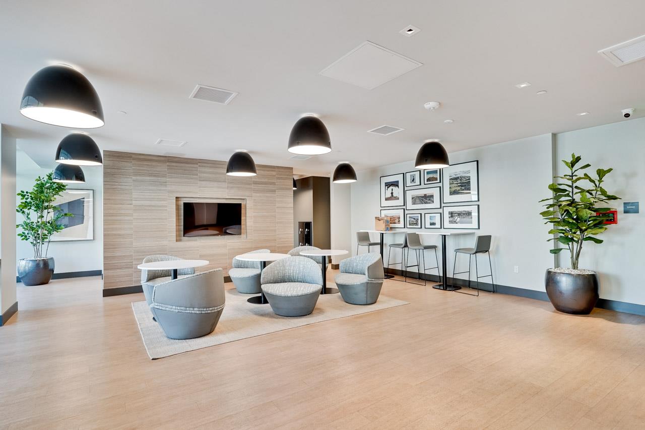 3698 Vision Common, Unit 221 Fremont, CA 94538 - Photo 42 of 62 a living room with furniture potted plant and a table