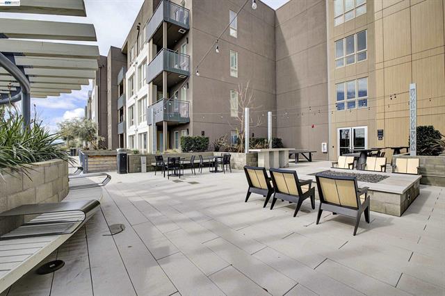 3698 Vision Common, Unit 221 Fremont, CA 94538 - Photo 46 of 62 a view of a patio with couches table and chairs and potted plants