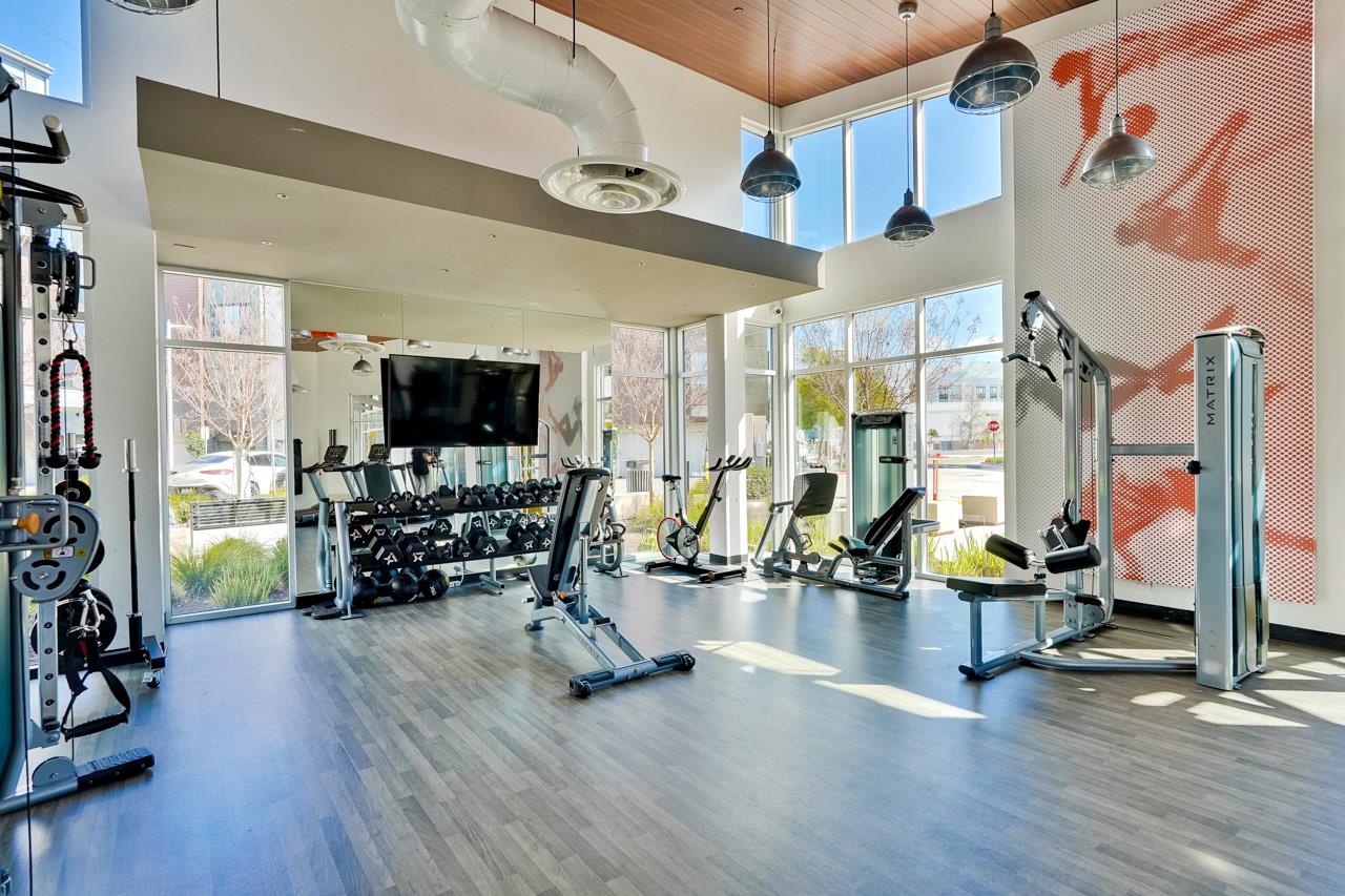 3698 Vision Common, Unit 221 Fremont, CA 94538 - Photo 57 of 62 a view of a room with gym equipment