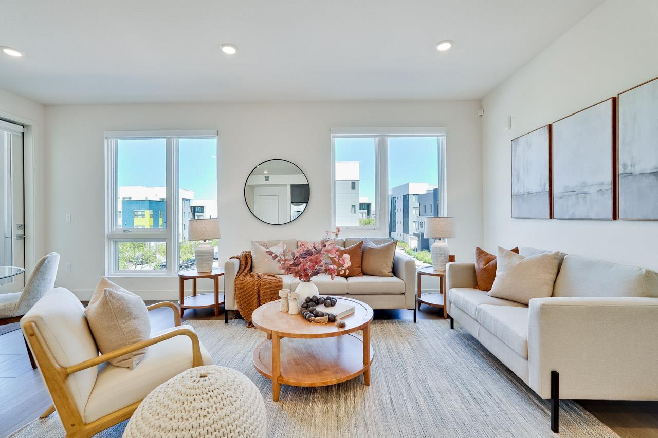 3698 Vision Common, Unit 221 Fremont, CA 94538 - Photo 7 of 62 a living room with furniture and a large window