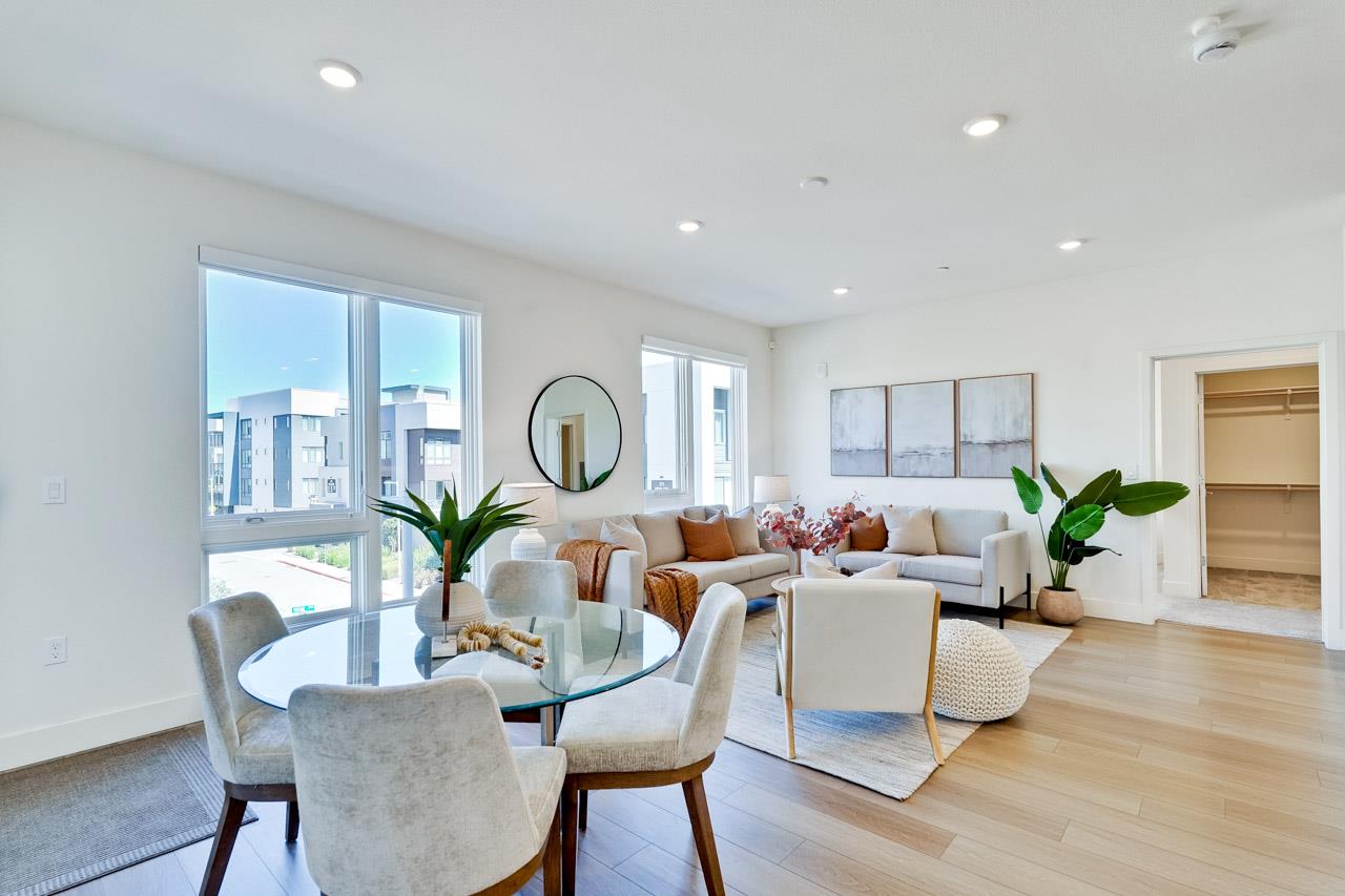 3698 Vision Common, Unit 221 Fremont, CA 94538 - Photo 9 of 62 a living room with furniture potted plant and windows