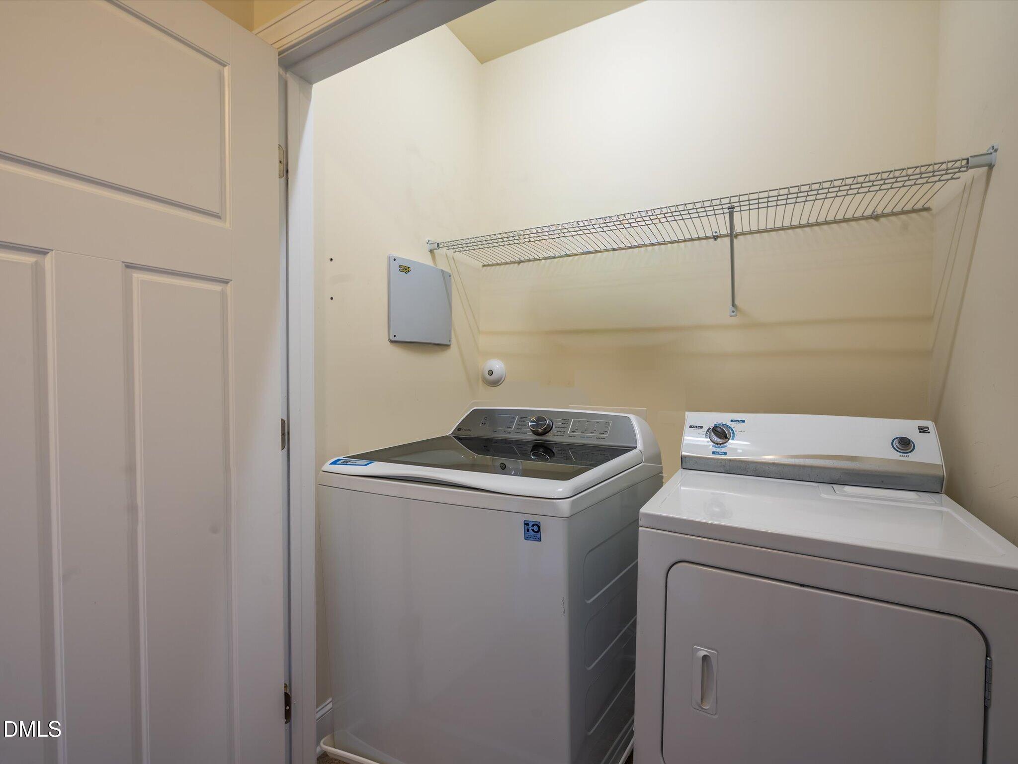 2808 Piedmont River Way Raleigh, NC 27606 - Photo 18 of 28 a utility room with dryer and washer
