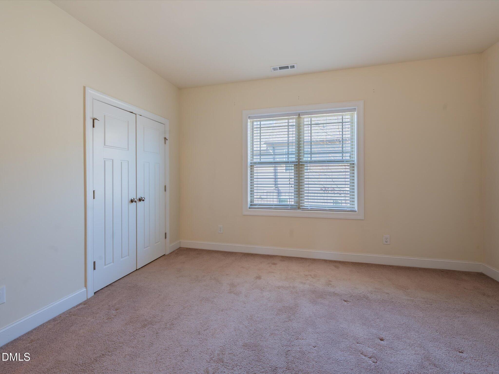 2808 Piedmont River Way Raleigh, NC 27606 - Photo 19 of 28 an empty room with windows