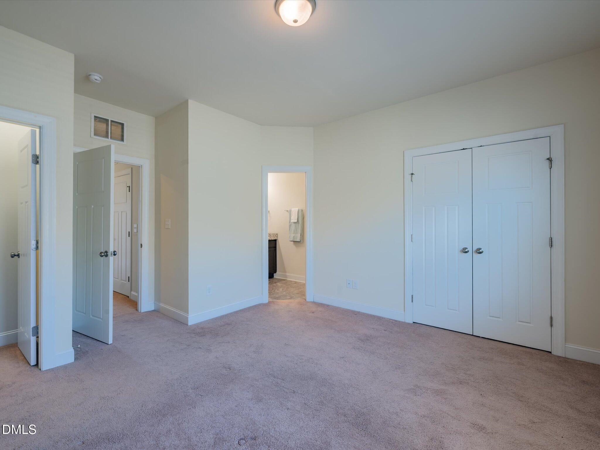 2808 Piedmont River Way Raleigh, NC 27606 - Photo 20 of 28 a view of an empty room and closet area