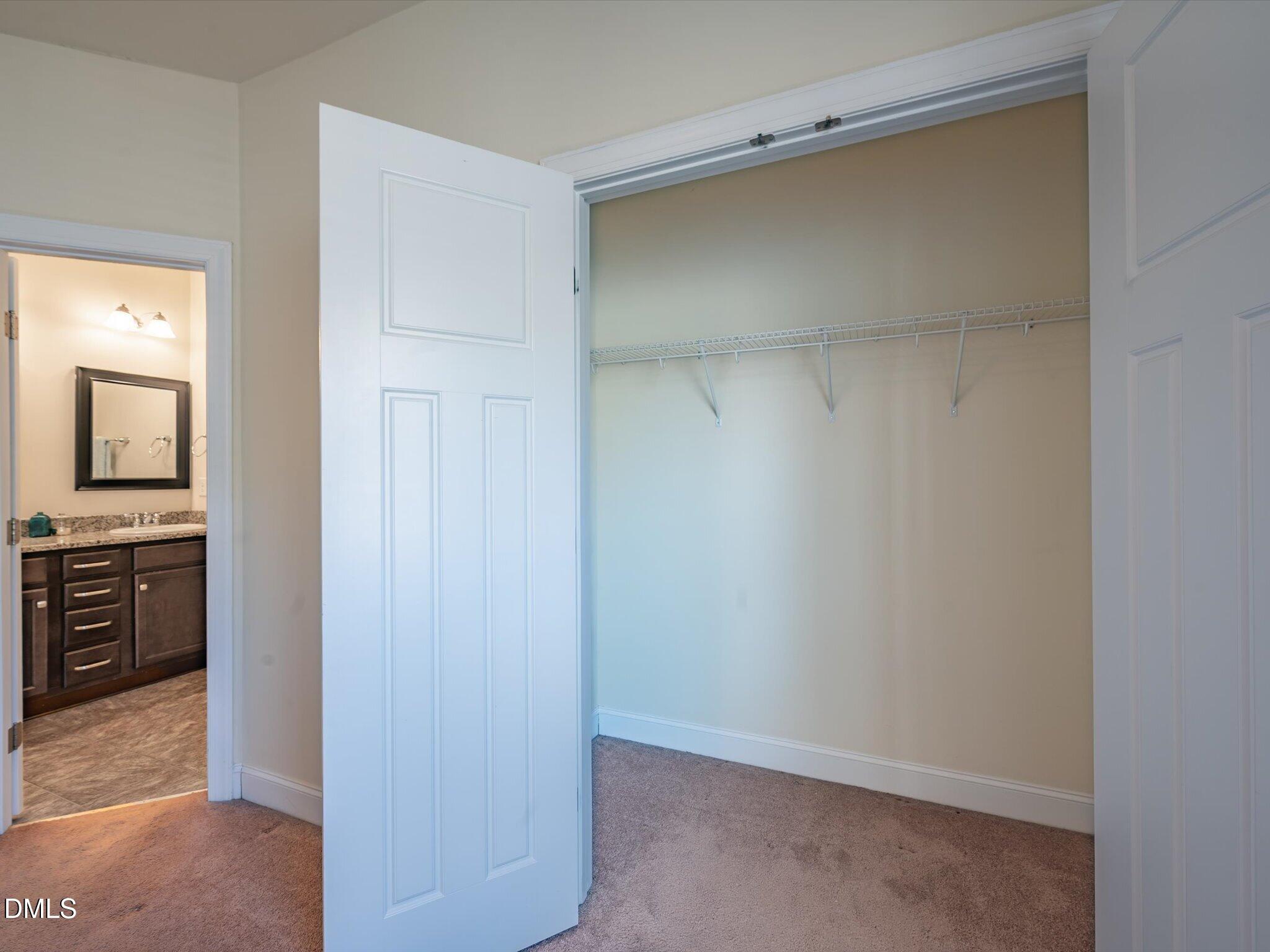2808 Piedmont River Way Raleigh, NC 27606 - Photo 21 of 28 a view of a kitchen with a refrigerator in a kitchen
